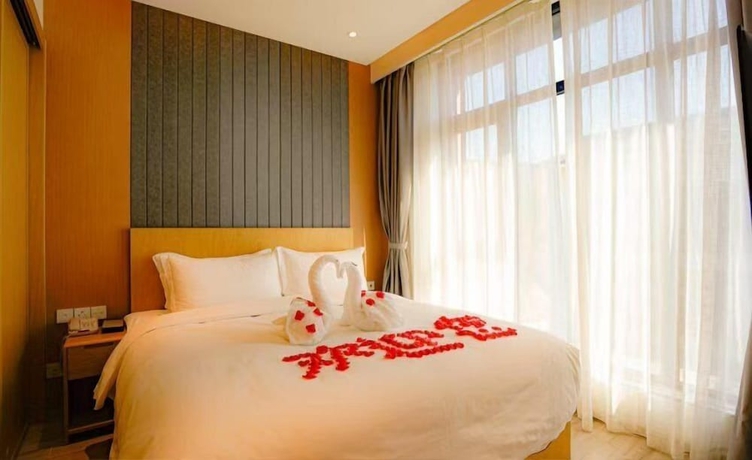 Imagen de la habitación del Hotel YunDing Grand Hotel South Apartment. Foto 8