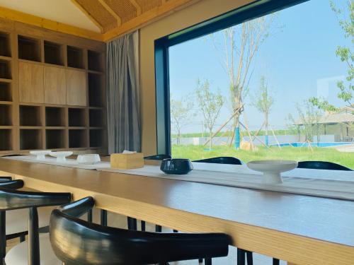 Imagen de la habitación del Hotel Yuncheng Yunxi Furusato-Banma Resort. Foto 15
