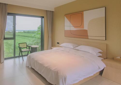 Imagen de la habitación del Hotel Yuncheng Yunxi Furusato-Banma Resort. Foto 18