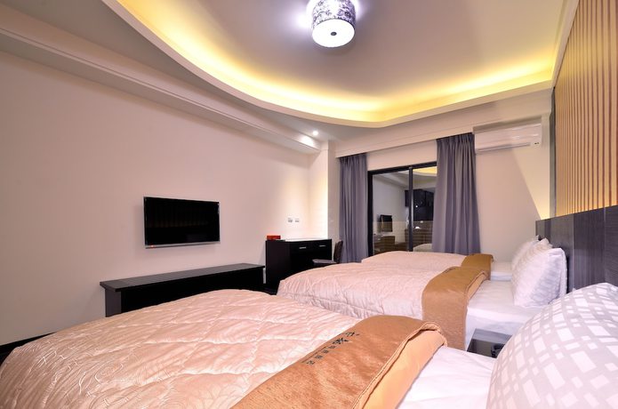 Imagen de la habitación del Hotel Yundu Business. Foto 3