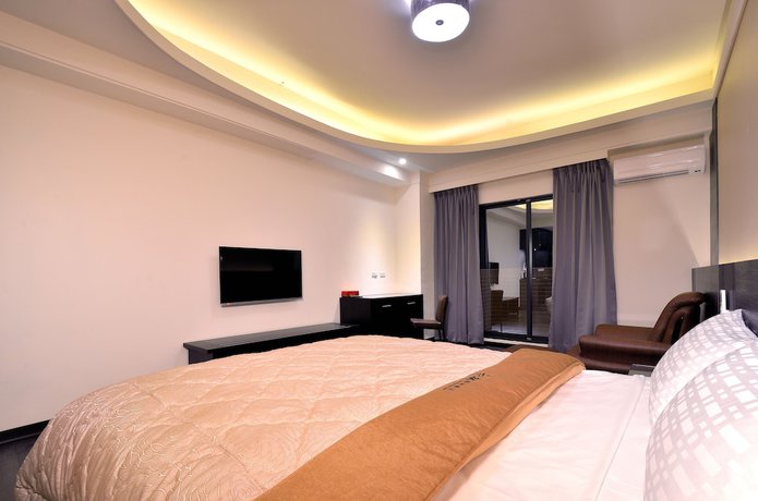 Imagen de la habitación del Hotel Yundu Business. Foto 5