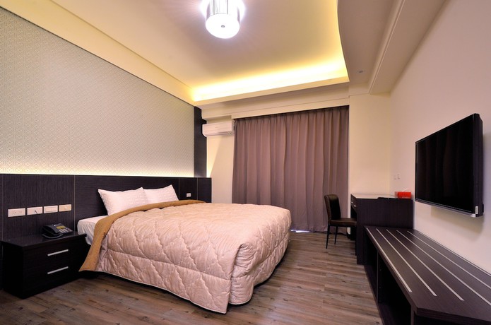 Imagen de la habitación del Hotel Yundu Business. Foto 6