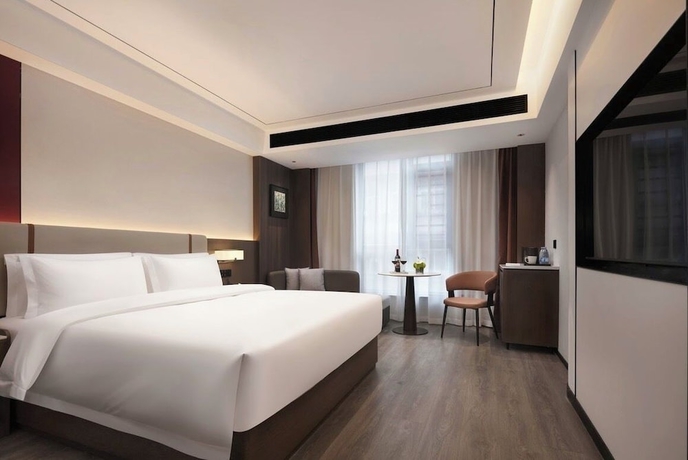 Imagen de la habitación del Hotel Yunduo International. Foto 2