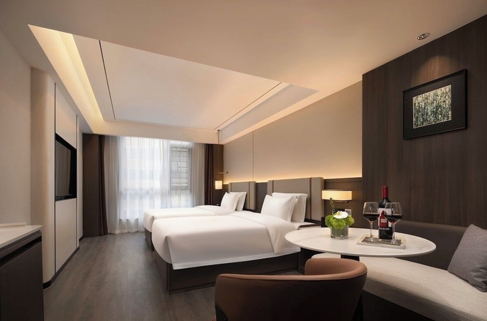 Imagen de la habitación del Hotel Yunduo International. Foto 3