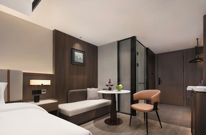 Imagen de la habitación del Hotel Yunduo International. Foto 8