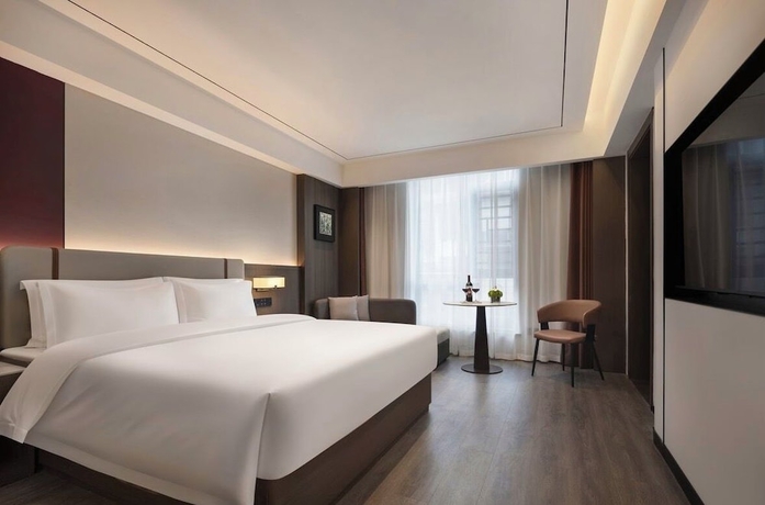 Imagen de la habitación del Hotel Yunduo International. Foto 12