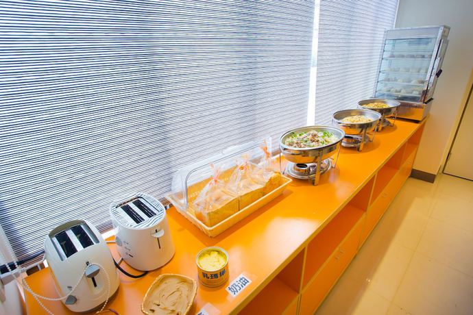 Imagen del bar/restaurante del Hotel Yung An Business. Foto 6