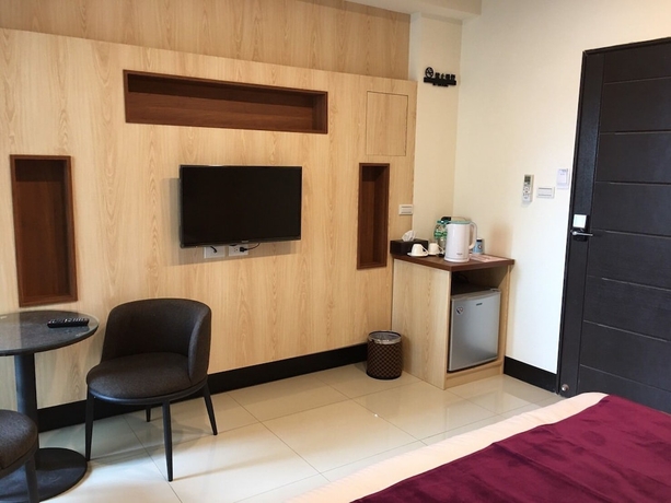 Imagen de la habitación del Hotel Yung Cheng. Foto 8