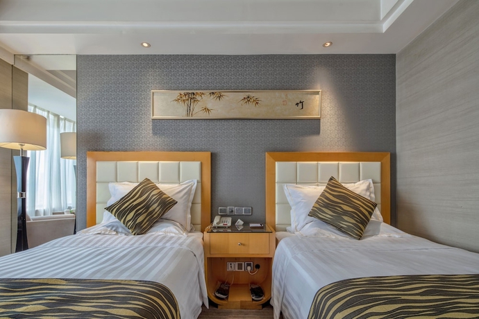 Imagen de la habitación del Hotel Yungang Jianguo Hotel. Foto 12