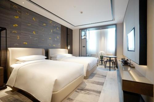 Imagen de la habitación del Hotel Yunhe Yebo (Shanghai International Tourism Resort Pudong Airport). Foto 8