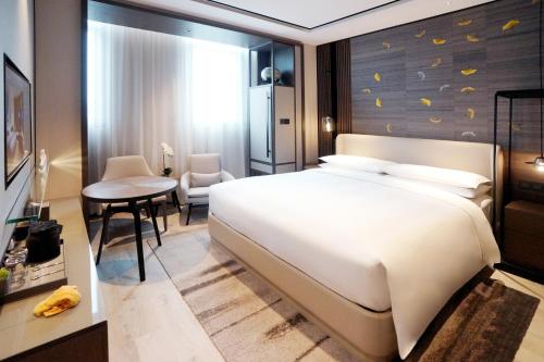 Imagen de la habitación del Hotel Yunhe Yebo (Shanghai International Tourism Resort Pudong Airport). Foto 9