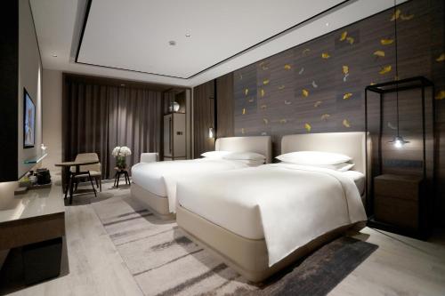 Imagen de la habitación del Hotel Yunhe Yebo (Shanghai International Tourism Resort Pudong Airport). Foto 10