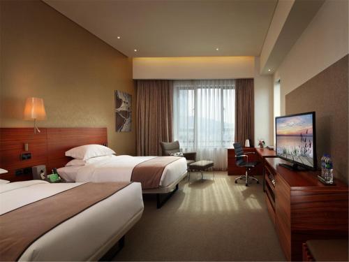 Imagen de la habitación del Hotel Yunkai. Foto 7