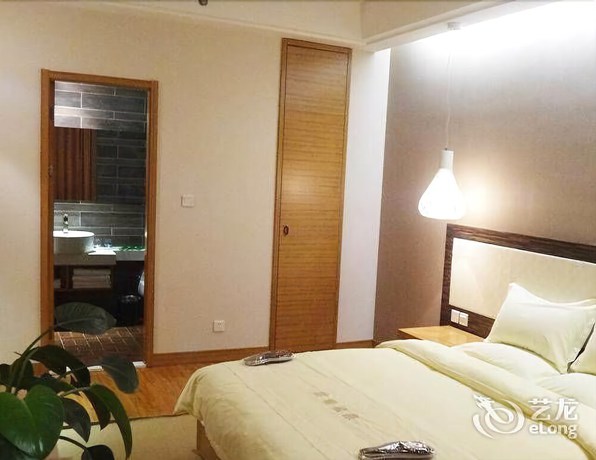 Imagen de la habitación del Hotel Yunlong Hotel. Foto 11