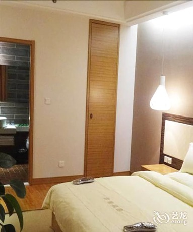 Imagen de la habitación del Hotel Yunlong Hotel. Foto 12