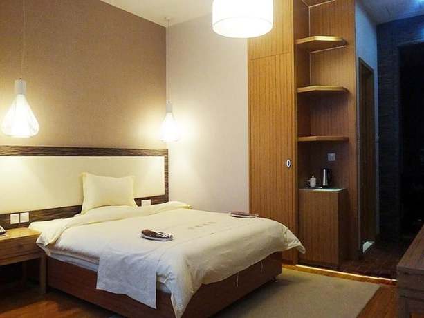 Imagen de la habitación del Hotel Yunlong Hotel. Foto 13