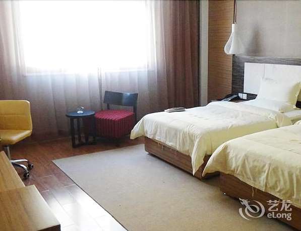 Imagen de la habitación del Hotel Yunlong Hotel. Foto 18