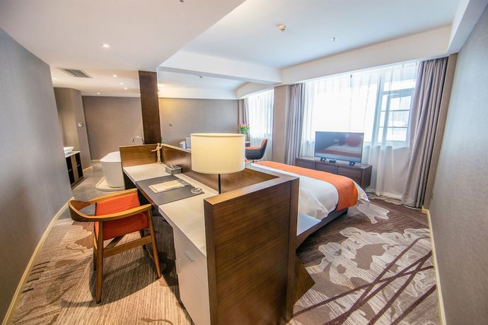 Imagen de la habitación del Hotel Yunman Kunming Donghua. Foto 3