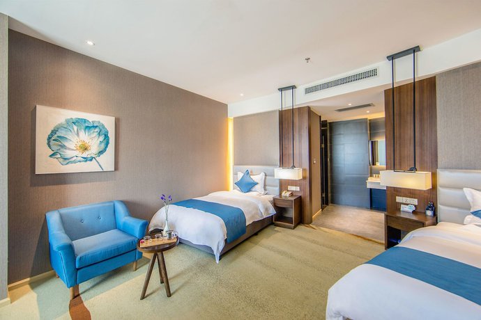 Imagen de la habitación del Hotel Yunman Kunming Donghua. Foto 4