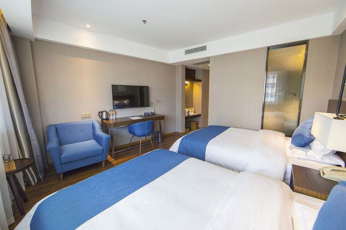 Imagen de la habitación del Hotel Yunman Kunming Donghua. Foto 9