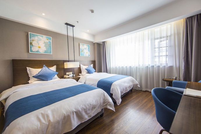 Imagen de la habitación del Hotel Yunman Kunming Donghua. Foto 11