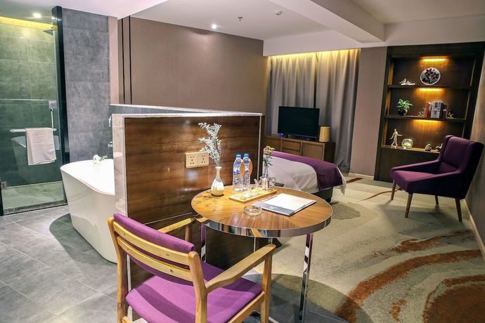 Imagen de la habitación del Hotel Yunman Kunming Donghua. Foto 12