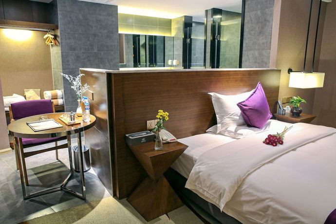 Imagen de la habitación del Hotel Yunman Kunming Donghua. Foto 15