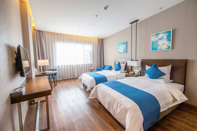 Imagen de la habitación del Hotel Yunman Kunming Donghua. Foto 17