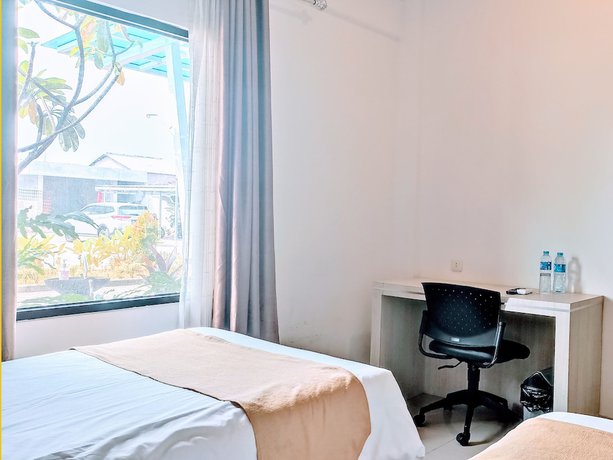 Imagen de la habitación del Hotel Yunna Express Lampung. Foto 3