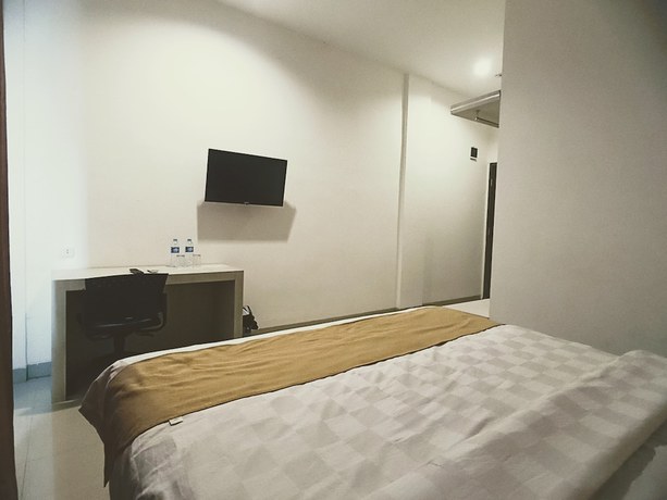 Imagen de la habitación del Hotel Yunna Express Lampung. Foto 5