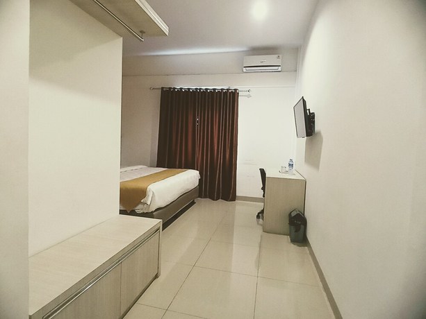 Imagen de la habitación del Hotel Yunna Express Lampung. Foto 7