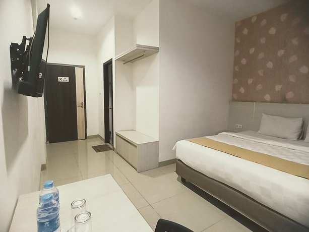 Imagen de la habitación del Hotel Yunna Express Lampung. Foto 9