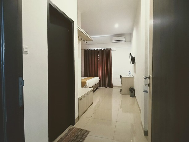 Imagen de la habitación del Hotel Yunna Express Lampung. Foto 10