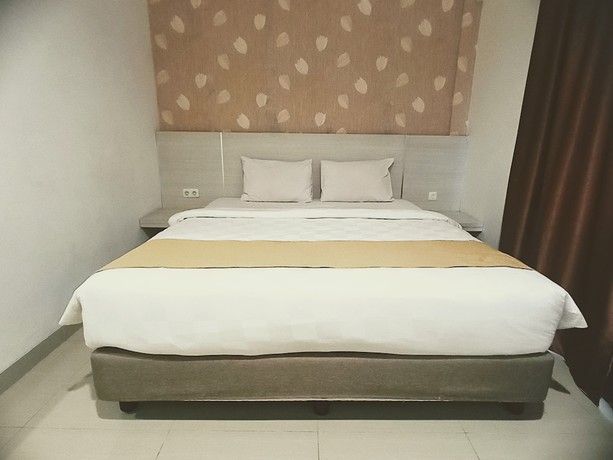 Imagen de la habitación del Hotel Yunna Express Lampung. Foto 16
