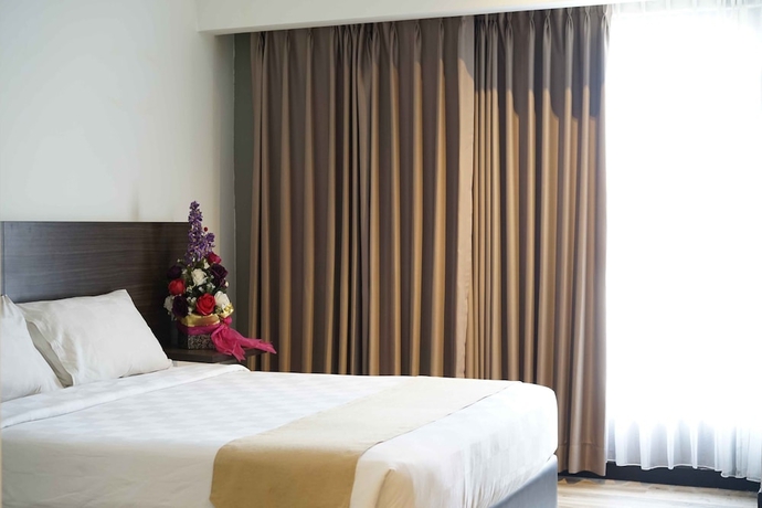 Imagen de la habitación del Hotel Yunna. Foto 9