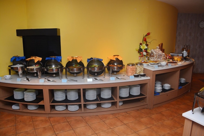 Imagen del bar/restaurante del Hotel Yunna. Foto 4