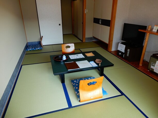 Imagen de la habitación del Hotel Yunominesou. Foto 17