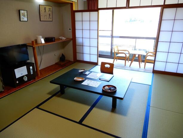 Imagen de la habitación del Hotel Yunominesou. Foto 18