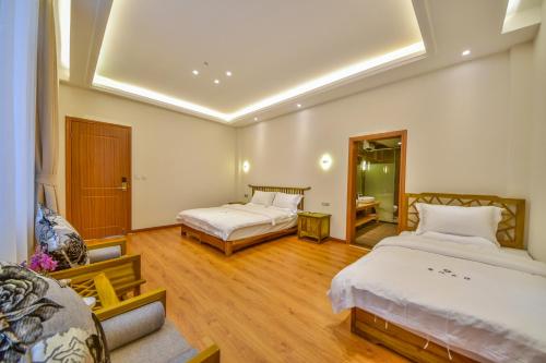 Imagen de la habitación del Hotel Yunshuo Dali Light Luxury Guesthouse. Foto 6