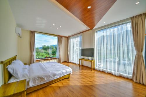 Imagen de la habitación del Hotel Yunshuo Dali Light Luxury Guesthouse. Foto 7