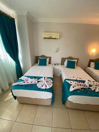 Imagen de la habitación del Hotel Yunus Oludeniz. Foto 18