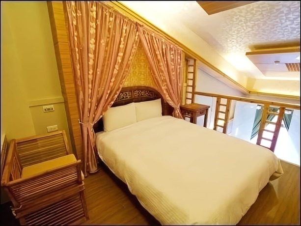 Imagen de la habitación del Hotel Yunwu. Foto 18