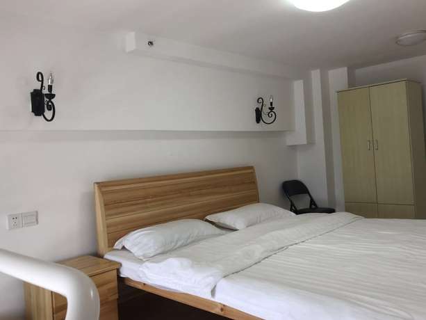 Imagen de la habitación del Hotel Yunzu Aparthotel - Huanlegu Branch. Foto 5