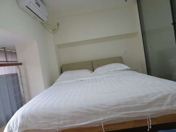 Imagen de la habitación del Hotel Yunzu Aparthotel - Huanlegu Branch. Foto 7