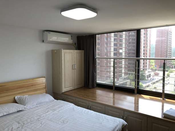 Imagen de la habitación del Hotel Yunzu Aparthotel - Huanlegu Branch. Foto 8