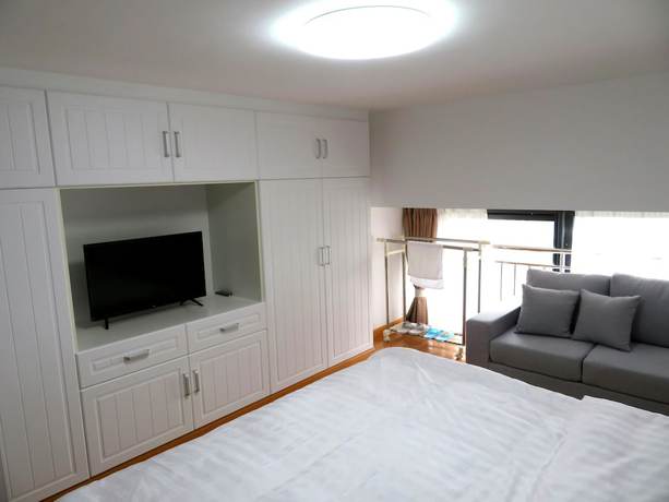 Imagen de la habitación del Hotel Yunzu Aparthotel - Huanlegu Branch. Foto 18