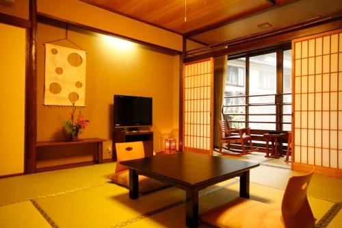 Imagen de la habitación del Hotel Yuraku Kinosaki Spa and Gardens. Foto 6