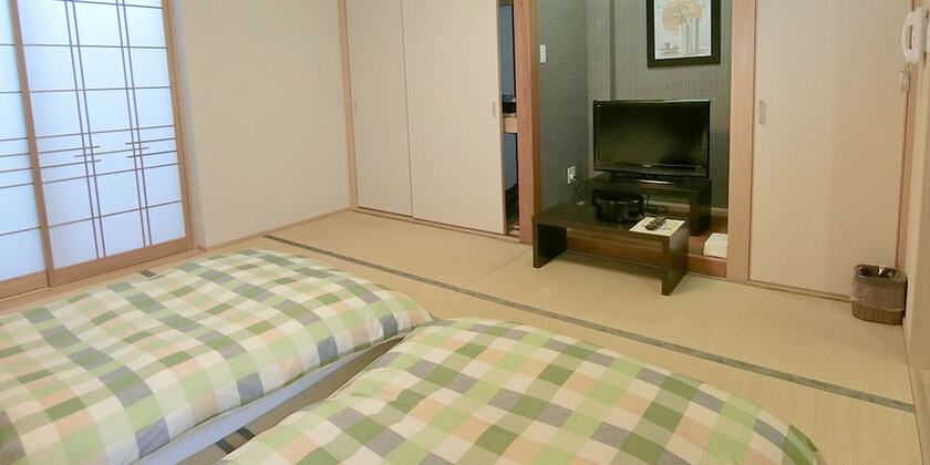 Imagen de la habitación del Hotel Yurakuan Miyazaki. Foto 18
