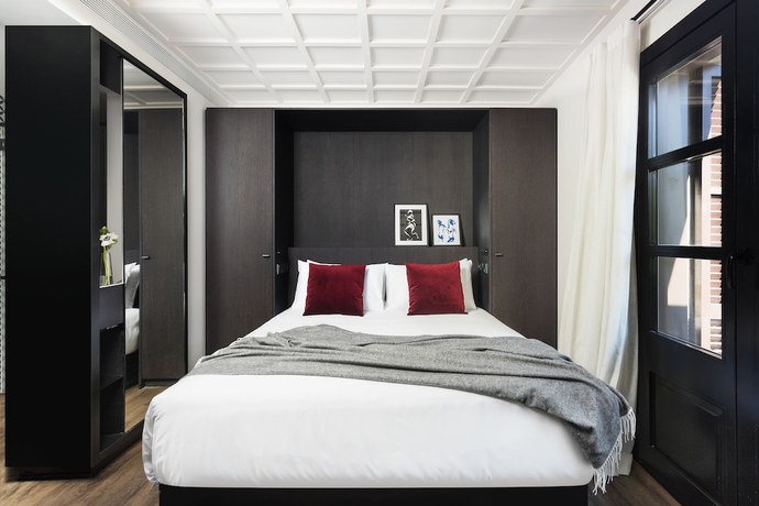 Imagen de la habitación del Hotel Yurbban Ramblas Boutique. Foto 4