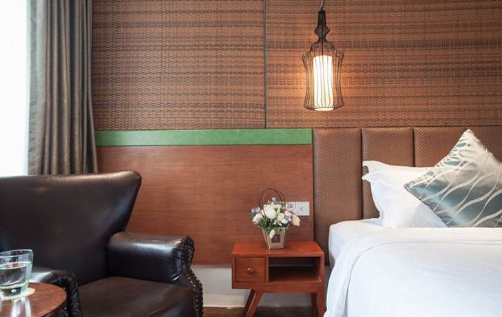 Imagen de la habitación del Hotel Yurong West Lake Cottage Resort. Foto 3
